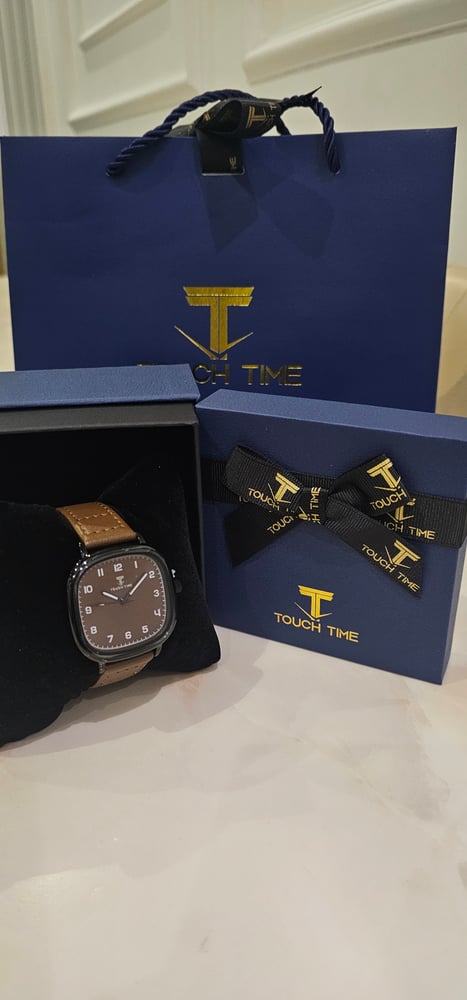 ساعة جلد رجالية ماركة TOUOH TIME ضد الماء ضمان سنة مع بوكس وكيس الماركة