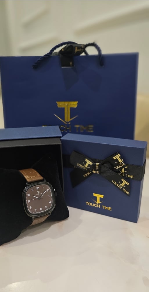 ساعة جلد رجالية ماركة TOUOH TIME ضد الماء ضمان سنة مع بوكس وكيس الماركة
