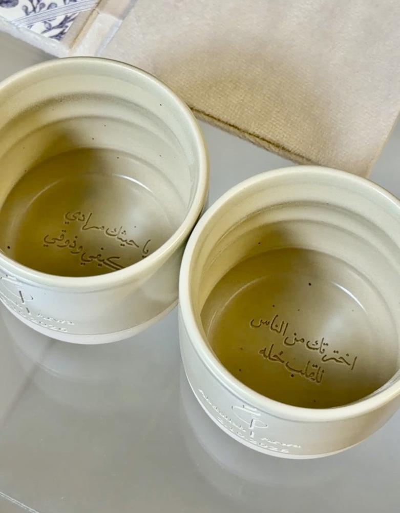 {بكج} مجلة + دفتر + كاستين + طقم الكيك +رسالة العمر العدد ٢ + قصاصات العدد ٤+ كوبين رخام بحفر الفايبر + قلم التوقيع شامل التطريز اليدوي تفصيل الون والشكل حسب طلبكم