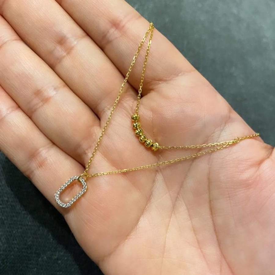 سلسلة أنيقة باللون الذهبي (N412) .