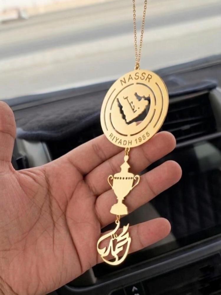 تعليقة النصر مع كاس الدوري