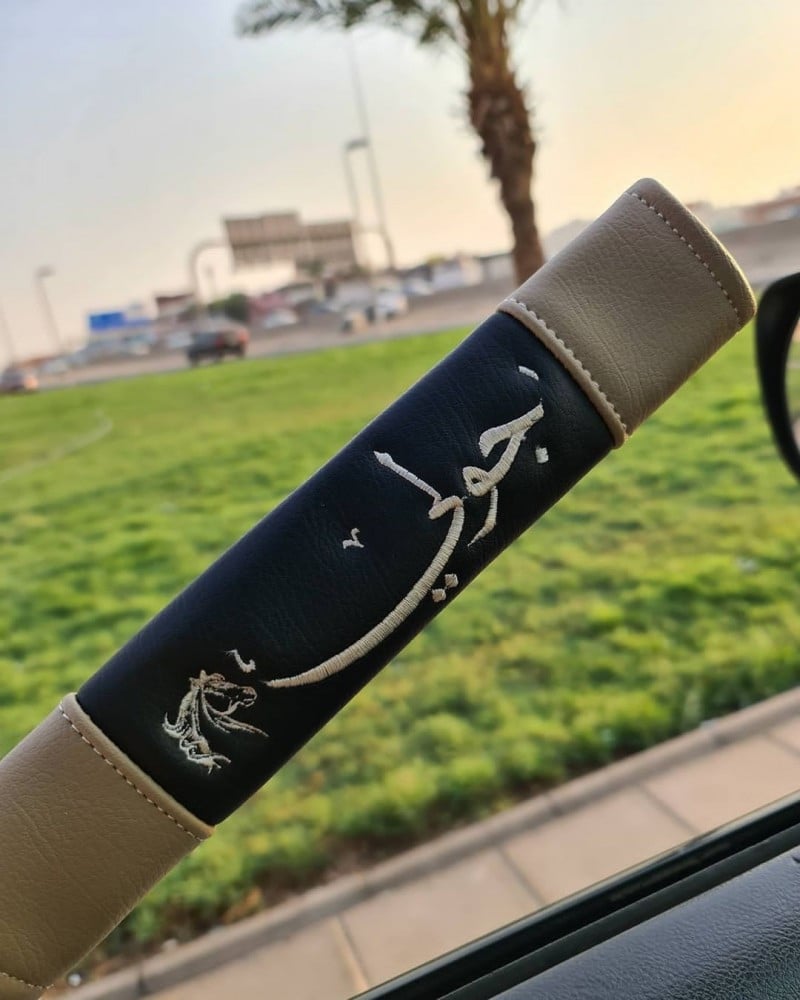 غطاء حزام الأمان بالاسم