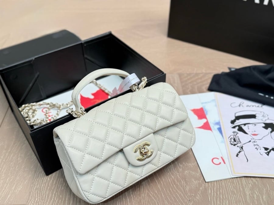 Mini flap bag with top handle