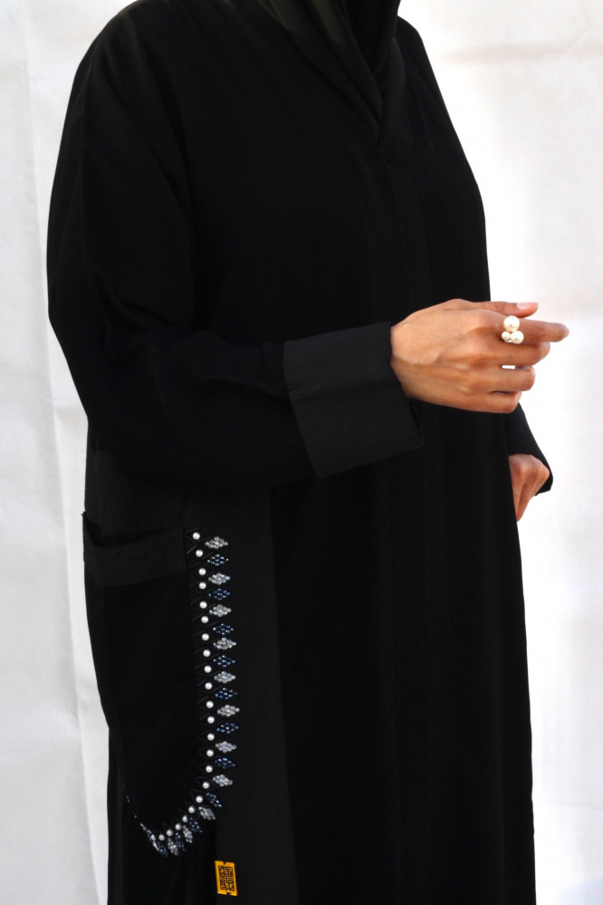 عبايه بجيوب