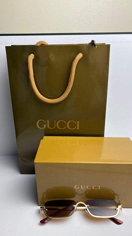 GLASSES GUCCI