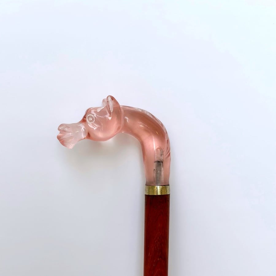 The horse stick is transparent, light wood