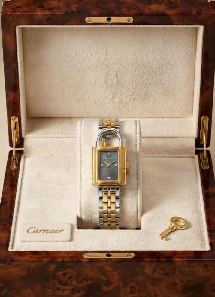 ساعة نسائية (CARNAER) بتصميم تصميم "القفل" الشهير (Padlock Watch)، بسوار أستيل  للونين ذهبي فضي مع علبة فاخرة ومفتاح