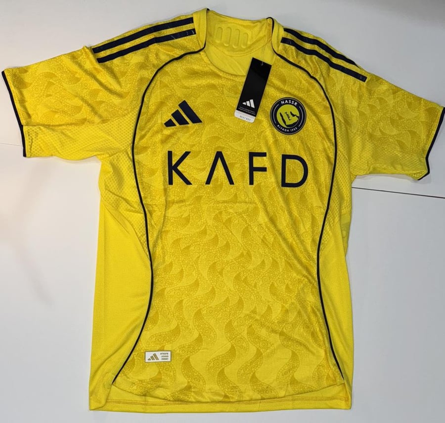تيشيرت نادي النصر الاساسي2026