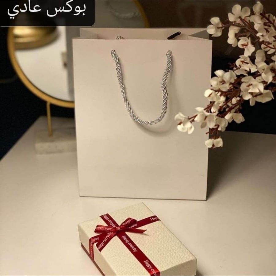 سلسال وحلق لويس فيتون