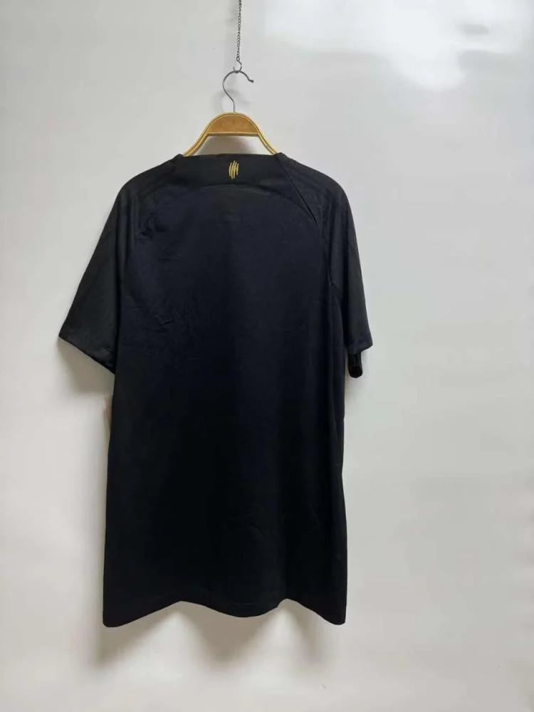 Black shirt with gold 2025/2026