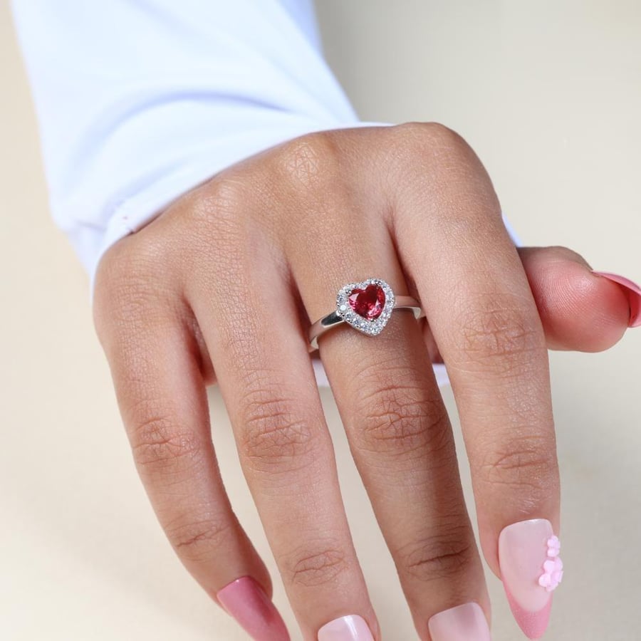 Silver ring with red zircon stone