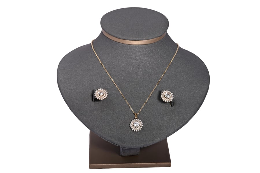 Half of a round zircon set