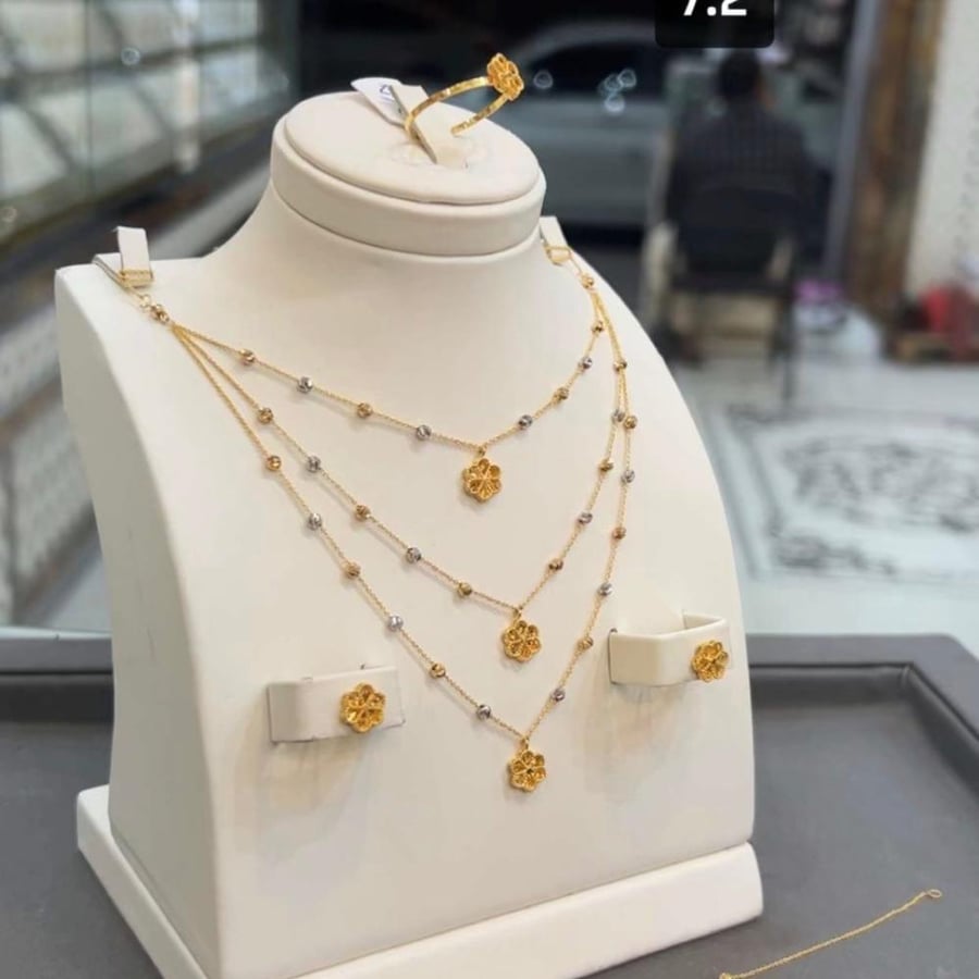 طقم ذهب خالص عيار 21
