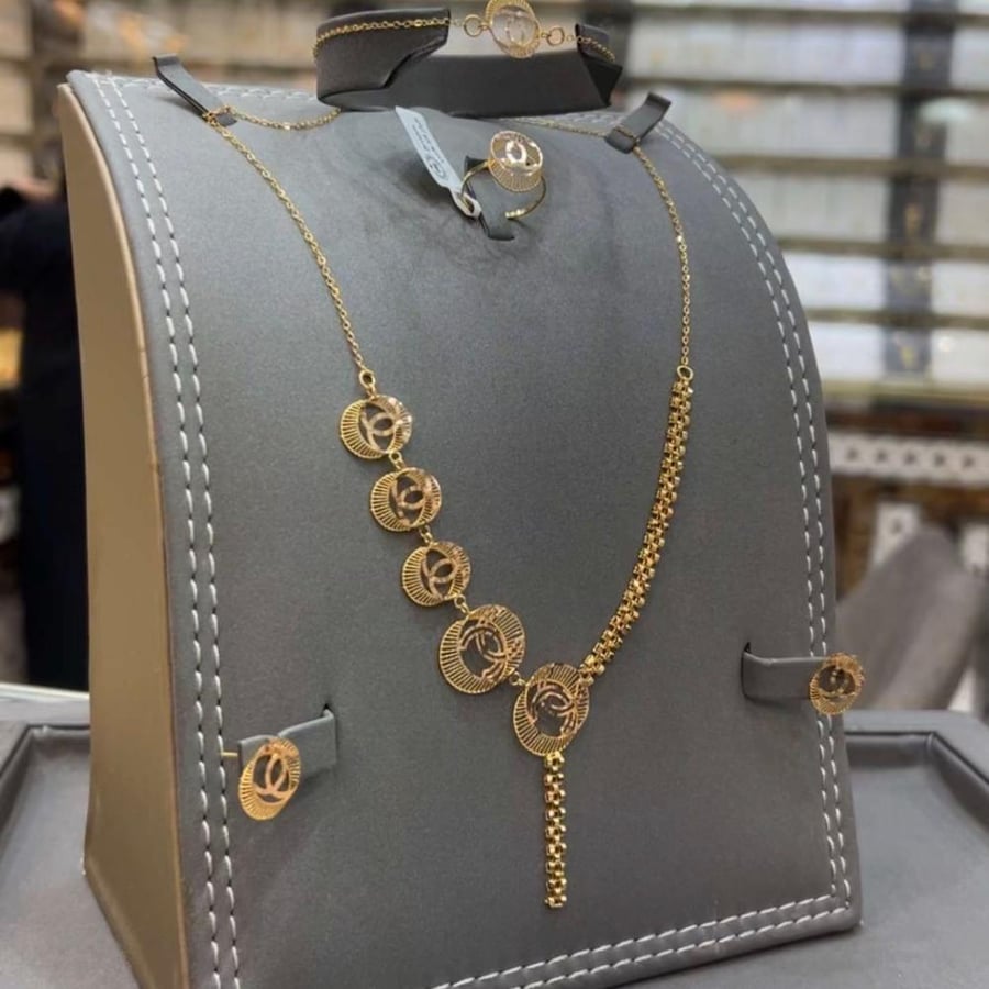 طقم ذهب خالص عيار 21