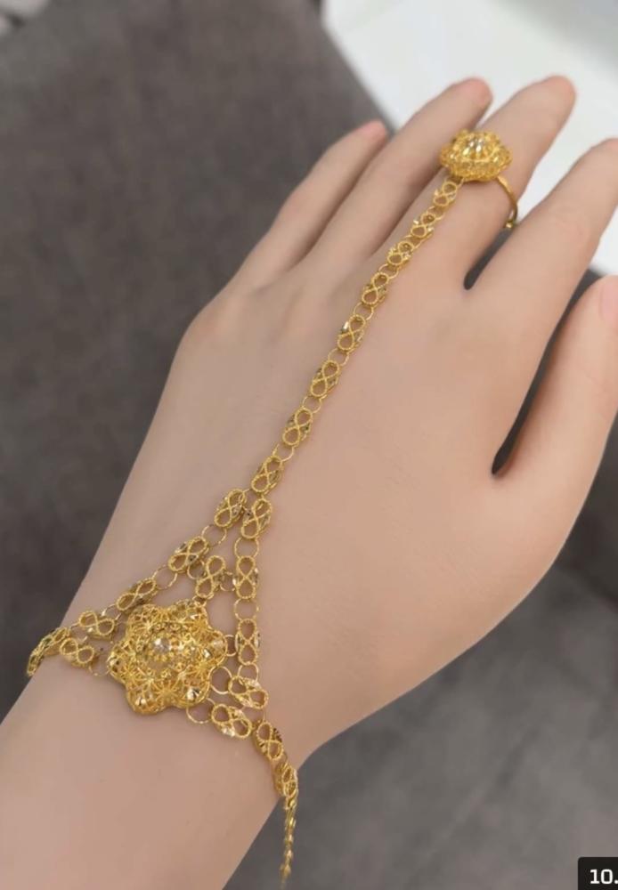 كف "نجمة الشرق" الفاخر - ذهب خالص عيار 21 بتصميم تخريم يدوي ✨