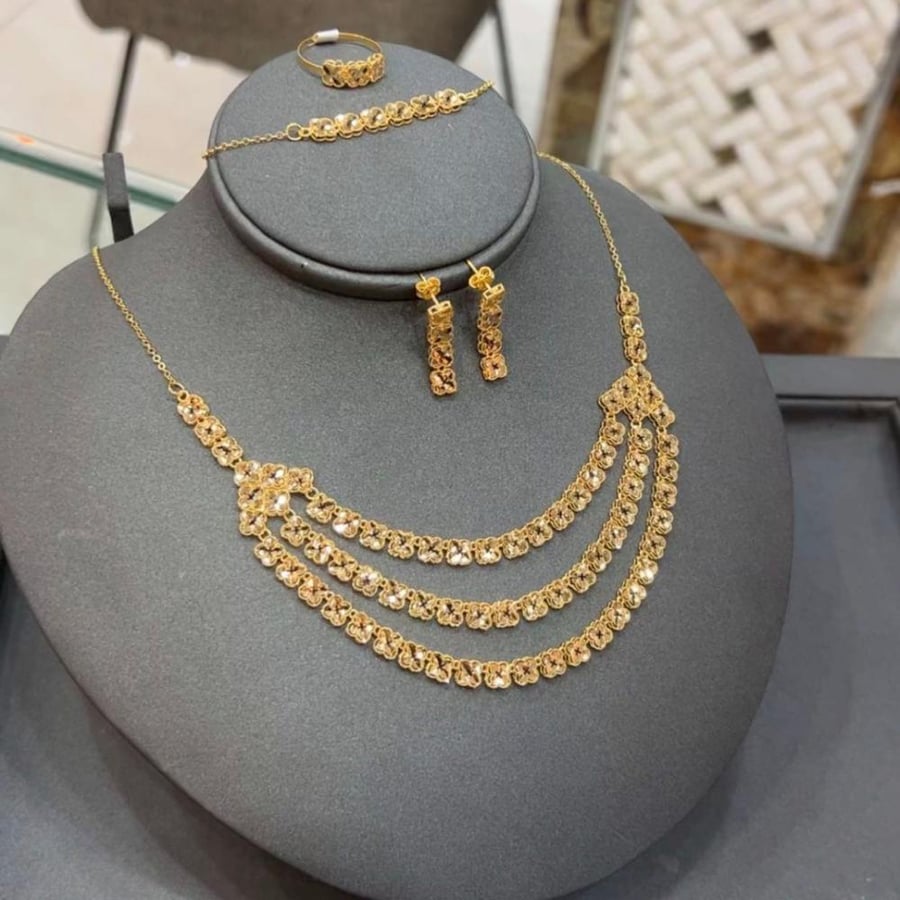 طقم ذهب خالص عيار 21
