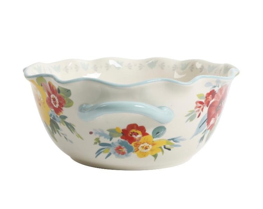 Ceramic basin with handle