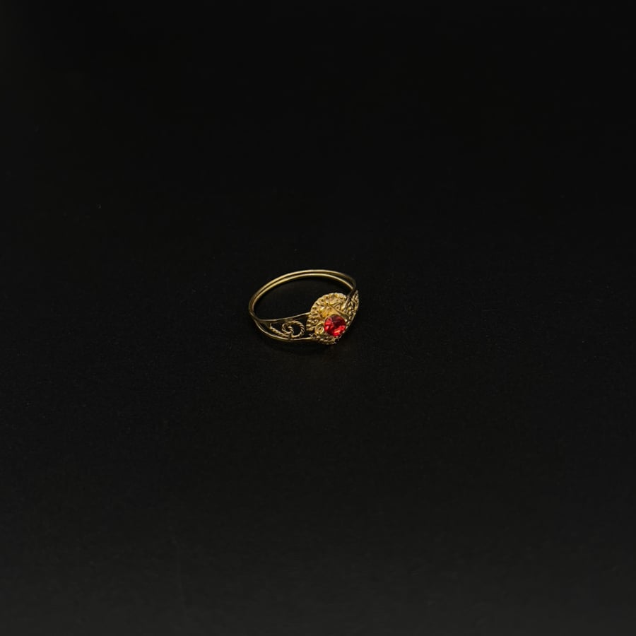 Gold ring 21 karat, weight 1.25 grams, multiple colors