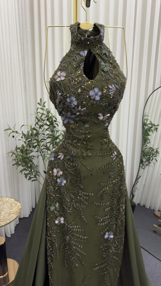 فستان زيتي سهره راقي تكرار