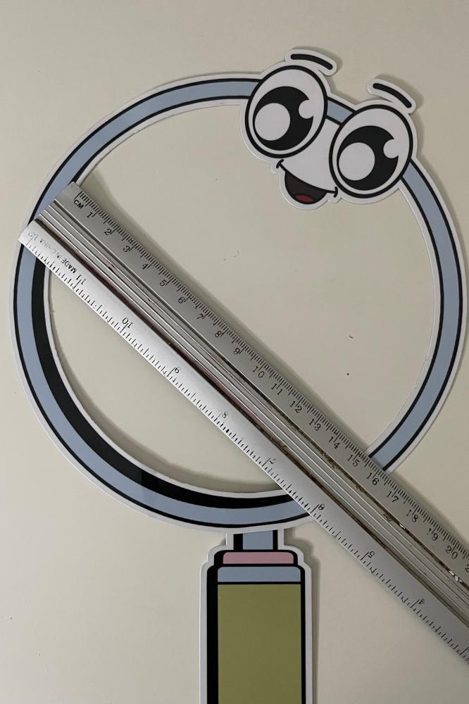 Paper magnifying lens shape