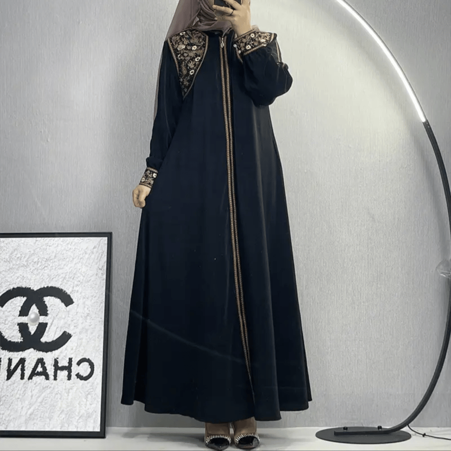 عباية إسلامية عصرية بجيوب وأكمام صغيرة للنساء