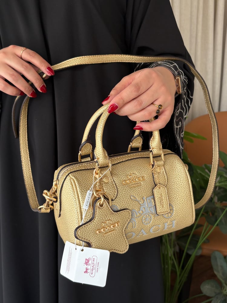 شنطه ماركه كوتش صغير