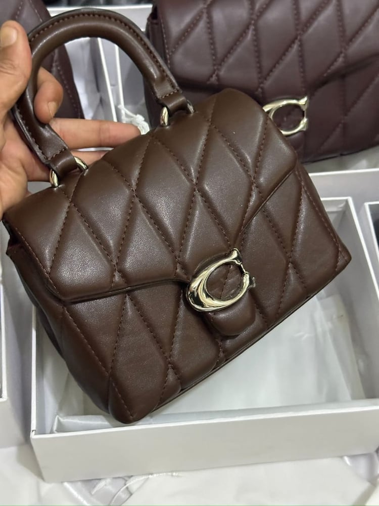 شنطه ماركه كوتش