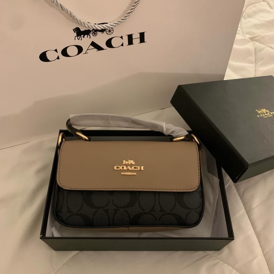 شنطه ماركه كوتش