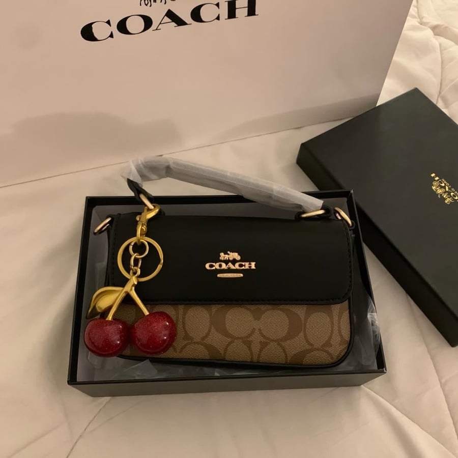 شنطه ماركه كوتش