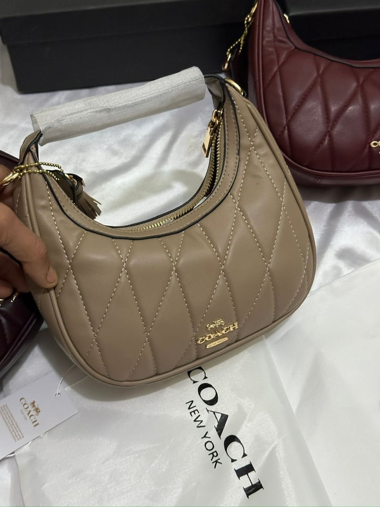 شنطه ماركه كوتش