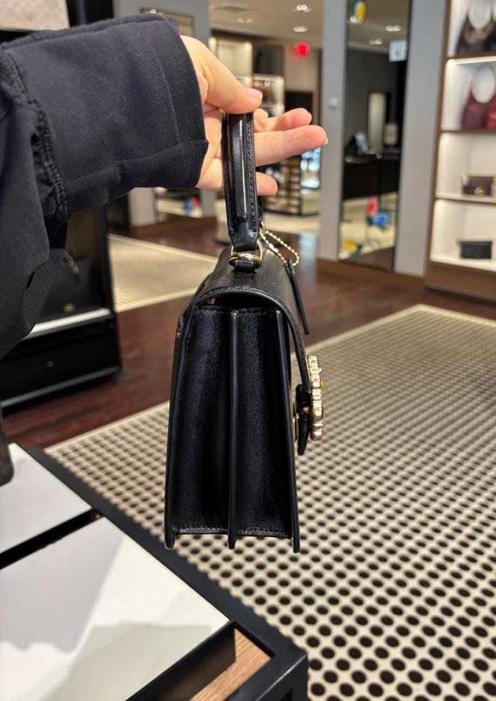 Brown crystal coach bag