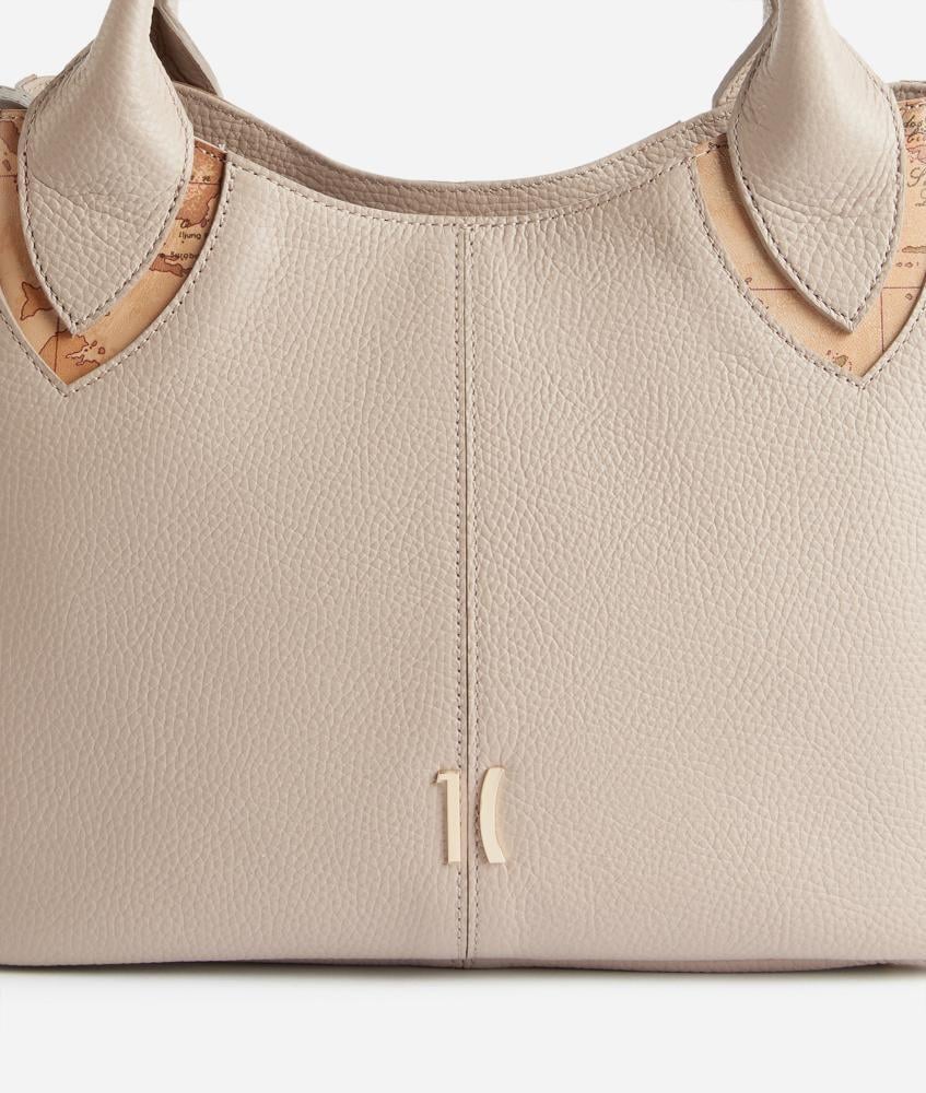 The beige Ferrari castle bag