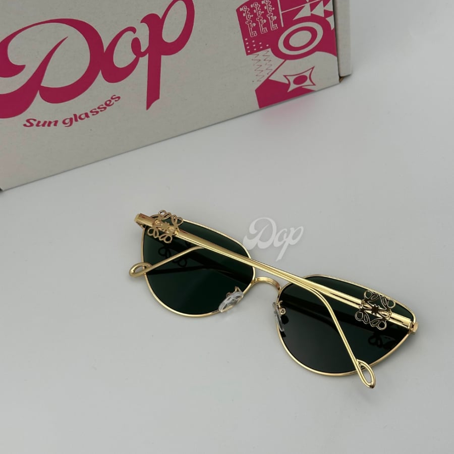 Loewe gold sunglasses with a gold frame and green lenses
