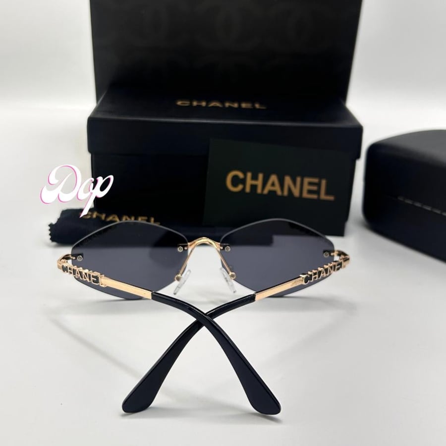 Chanel gold frameless sunglasses with black lenses