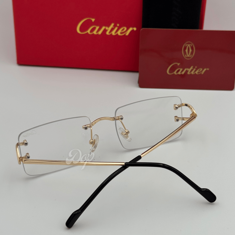 Cartier gold metal sunglasses with clear lenses
