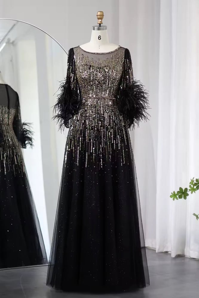 فستان سهرة أسود لامع شك بأكمام