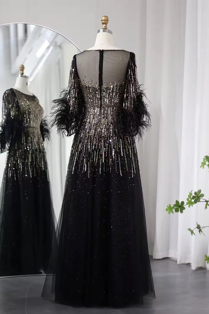 فستان سهرة أسود لامع شك بأكمام