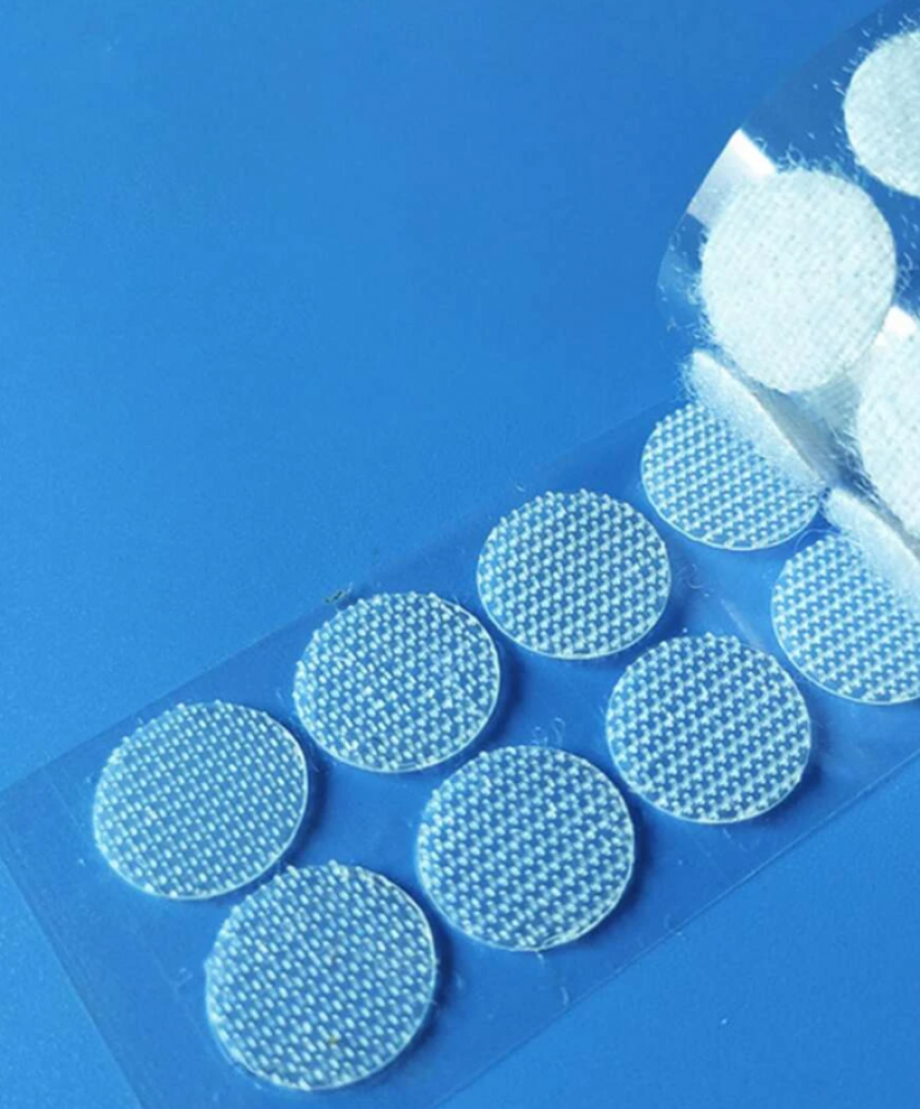 Clothing labels made of polyamide material, self-adhesive with round dots attached with a ring hook, 24 pieces