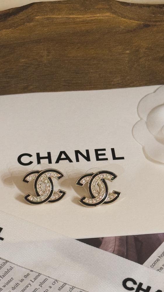 Chanel earrings black gold