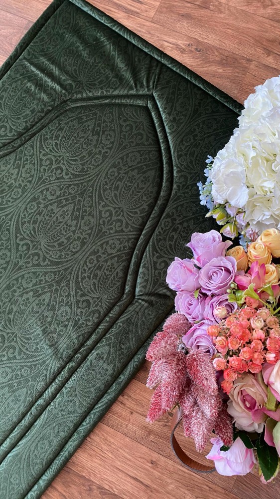 Green prayer rug