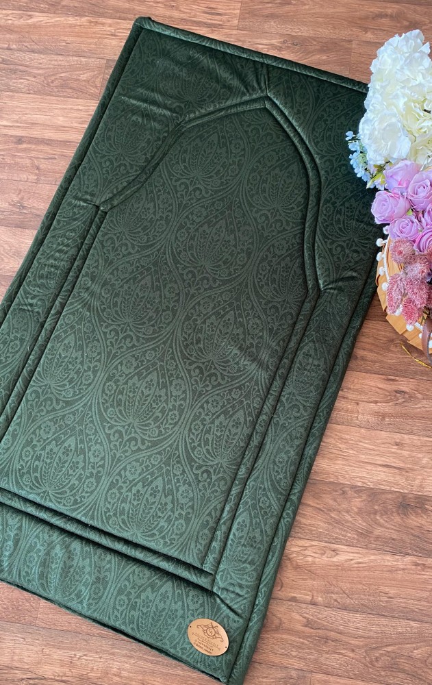 Green prayer rug
