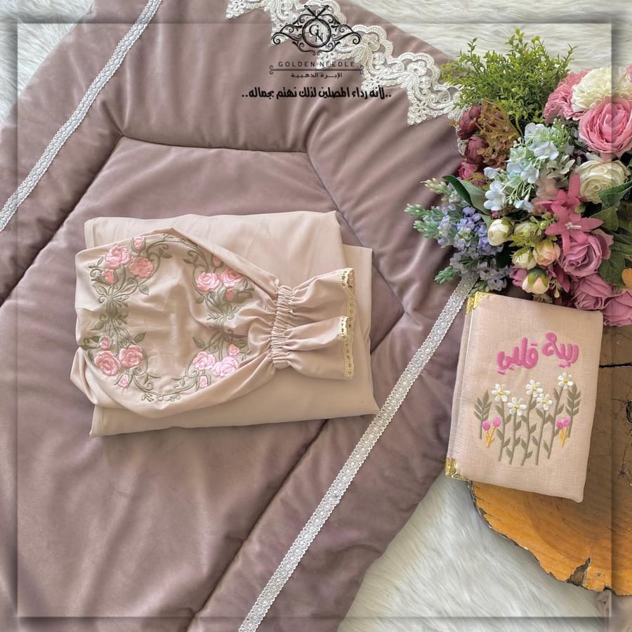 A prayer set with regular style embroidered clothing and a prayer rug