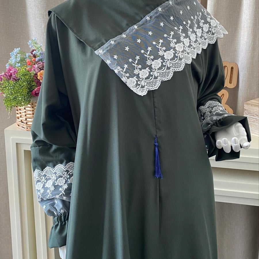 Prayer attire with a green royal hijab