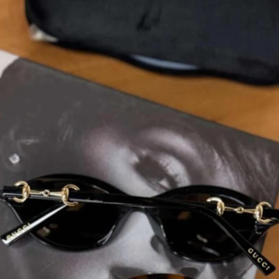 ‏GUCCI