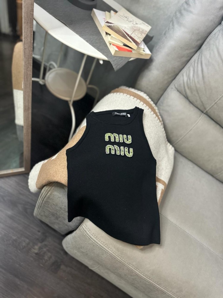 MIU MIU ميو ميو