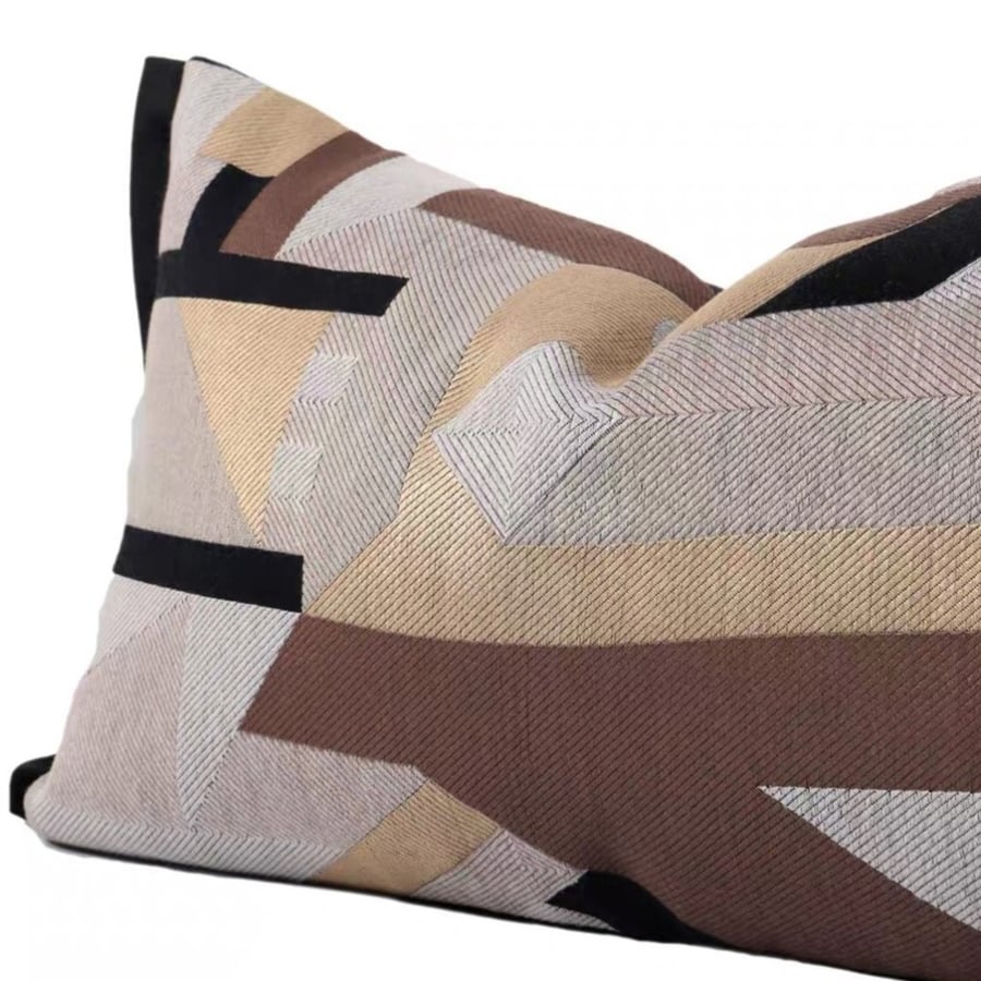 Engineering design cushion in brown and gold