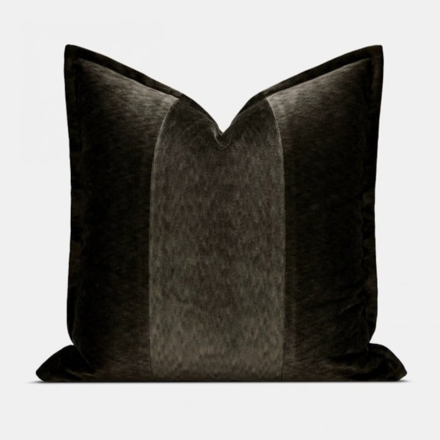 Black velvet cushion with a touch of brown