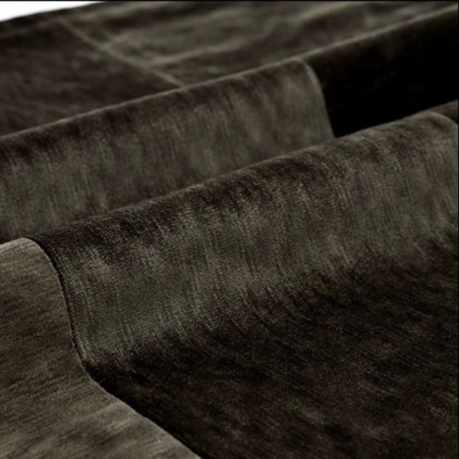 Black velvet cushion with a touch of brown