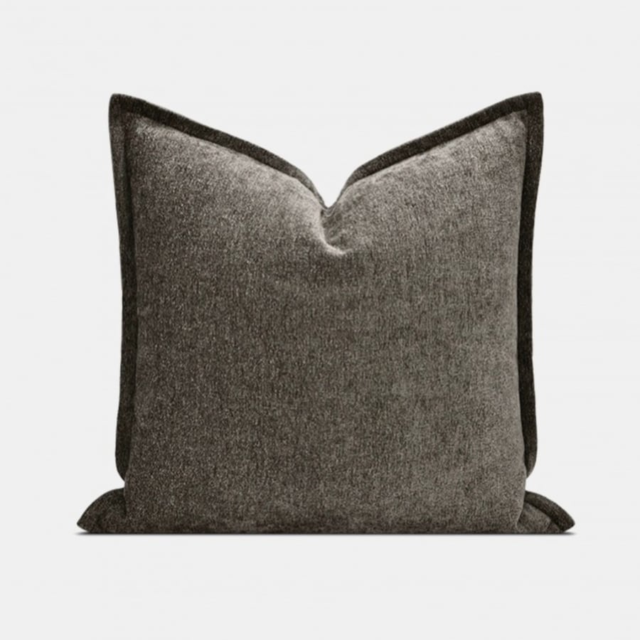 Black velvet cushion with a touch of brown