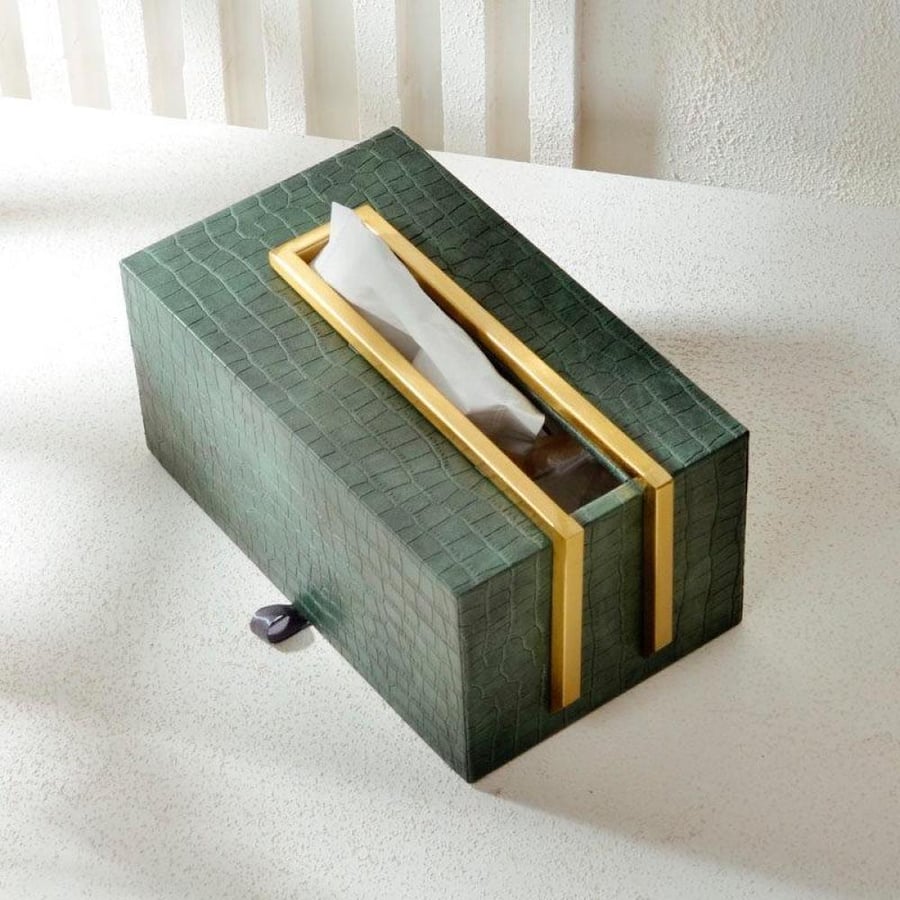 A box of green-colored tissues